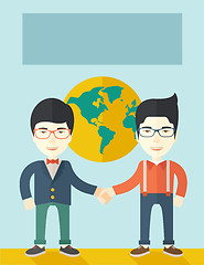 Image showing Two chinese guys happily handshaking.