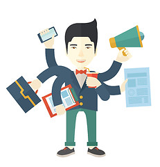 Image showing Young but happy japanese employee doing multitasking office tasks.