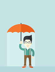 Image showing Successful man with umbrella.