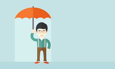 Image showing Successful man with umbrella.