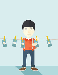 Image showing Chinese buisnessman hang his money.