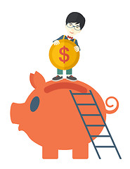 Image showing Big piggy bank with ladder