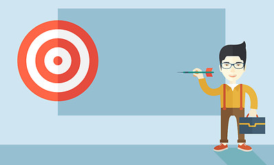 Image showing Working chinese man holding a target arrow 