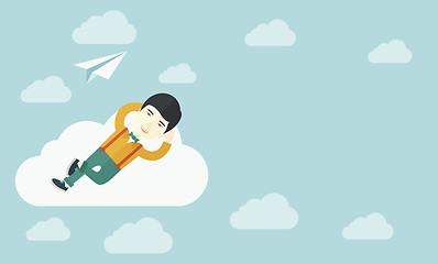 Image showing Asian man lying on a cloud with paper plane.