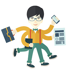 Image showing Chinese guy with multitasking job.