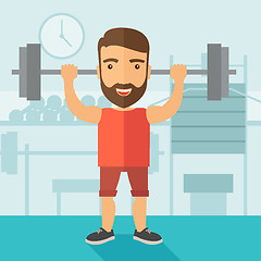 Image showing Handsome man lifting a barbell