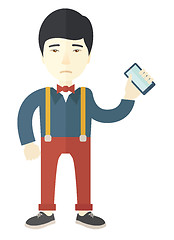 Image showing Japanese man with smartphone in hand.