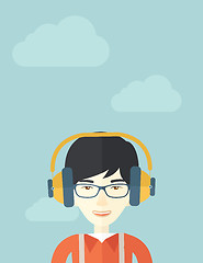 Image showing Chinese young guy with headphone.