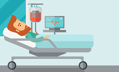 Image showing Patient in hospital bed being monitored