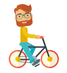 Image showing Man riding a bicycle.