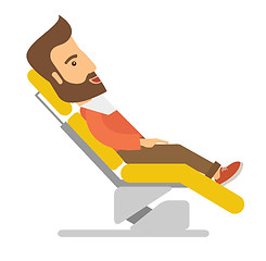 Image showing Man lying in dentist chair.