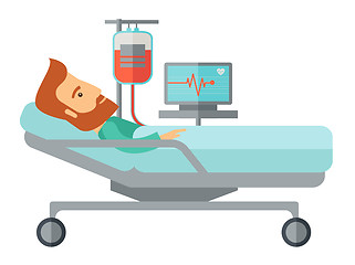 Image showing Patient in hospital bed being monitored