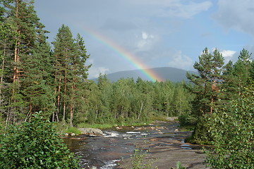 Image showing Rainbow over creek