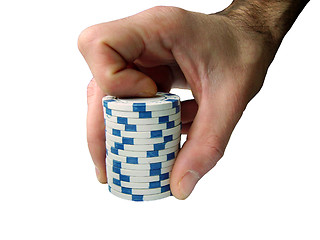 Image showing hand with casino chips