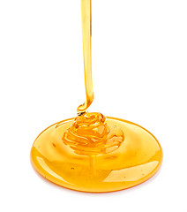 Image showing pouring honey