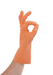 Image showing Hand gesturing with orange cleaning product glove