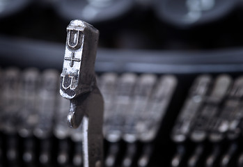 Image showing U hammer - old manual typewriter - cold blue filter