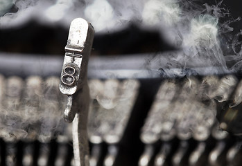 Image showing 8 hammer - old manual typewriter - mystery smoke