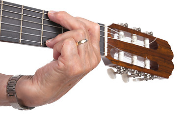 Image showing Old hand and guitar isolated