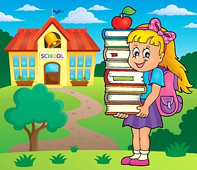 Image showing Girl holding books theme image 2