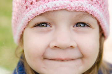 Image showing Close-up portrait of a smiling three-year girl