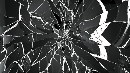 Image showing Pieces of splitted or cracked glass on white