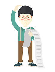 Image showing Sad japanese employee holding a list of payables.