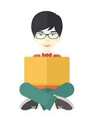 Image showing Chinese guy reading a book