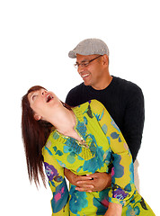 Image showing Happy middle age couple joking around.