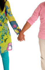 Image showing Couple walking hand in hand.