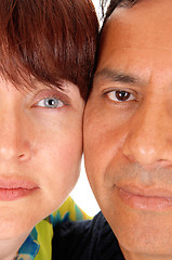 Image showing The halve faces of a middle age couple.