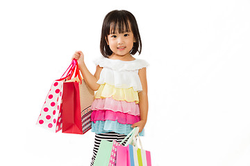 Image showing Asian Kid with shopping bag