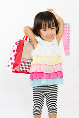 Image showing Asian Kid with shopping bag