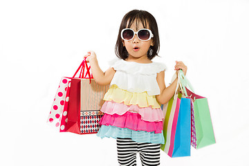 Image showing Asian Kid with shopping bag