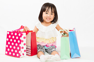 Image showing Asian Kid with shopping bag