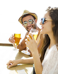 Image showing Friends drinking a cold beer