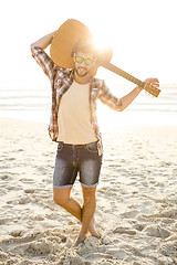 Image showing Handsome young man at the beach