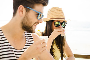 Image showing Friends at the beach bar