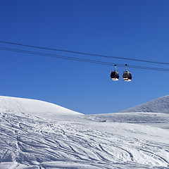 Image showing Two gondola lifts at ski resort