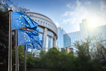 Image showing European union flag against parliament in Brussels