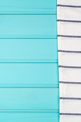 Image showing Blue and white towel over table