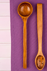 Image showing Kitchenware on purple towel