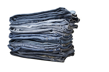 Image showing the heap of modern designer blue jeans