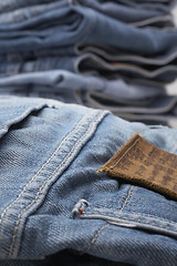 Image showing the heap of modern designer blue jeans