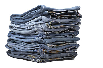 Image showing the heap of modern designer blue jeans