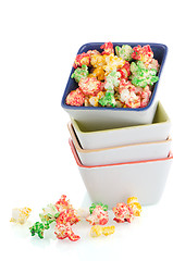 Image showing Pile of ceramic bowls of popcorn