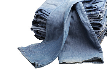 Image showing the heap of modern designer blue jeans