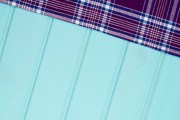 Image showing Purple towel over wooden table