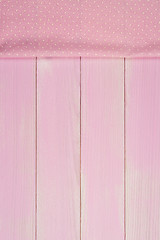 Image showing Pink towel over wooden table