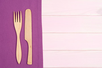 Image showing Kitchenware on purple towel